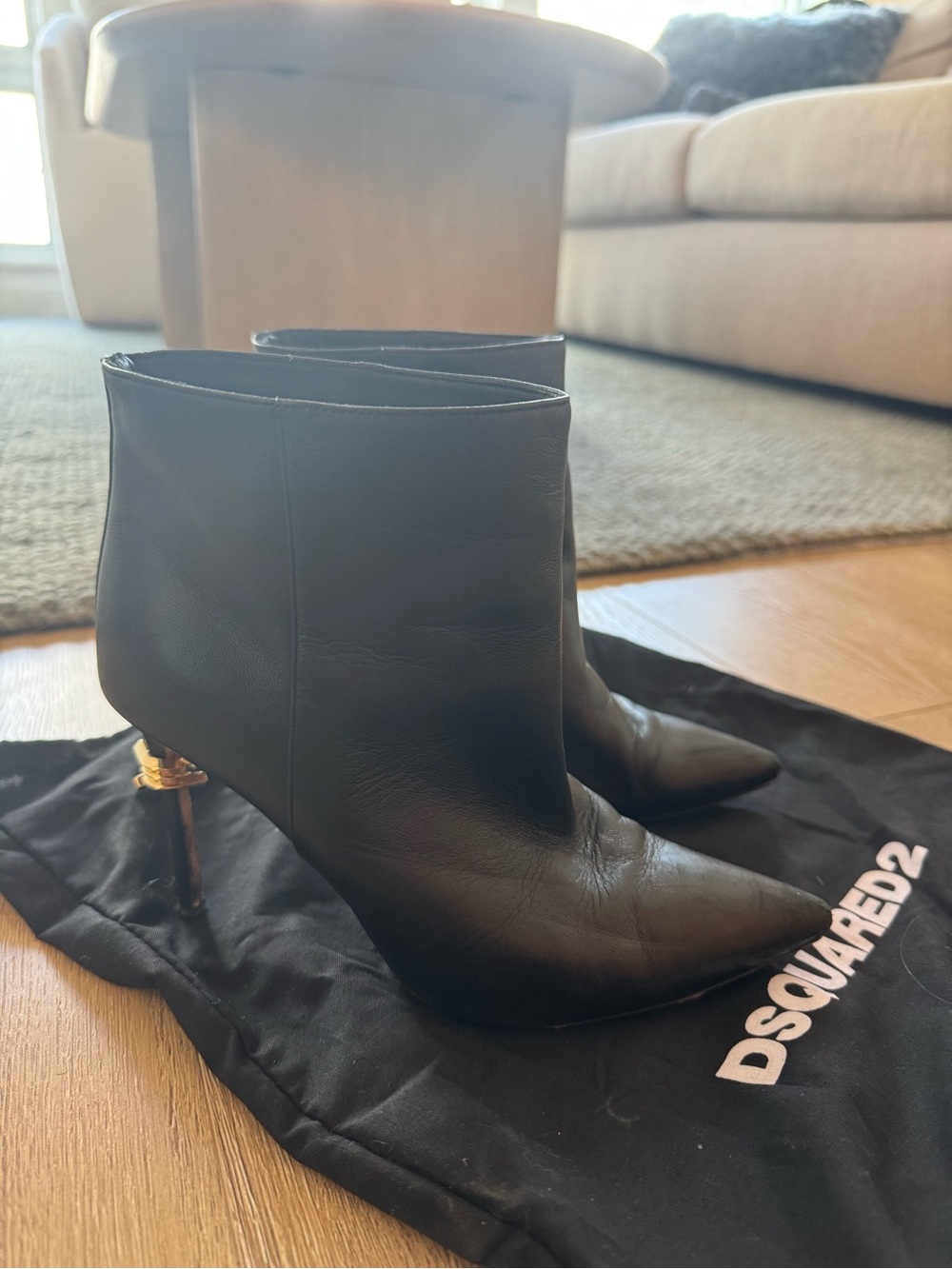 DSQUARED2 Black Leather Pointed Toe Ankle Booties with Gold Heel Accent